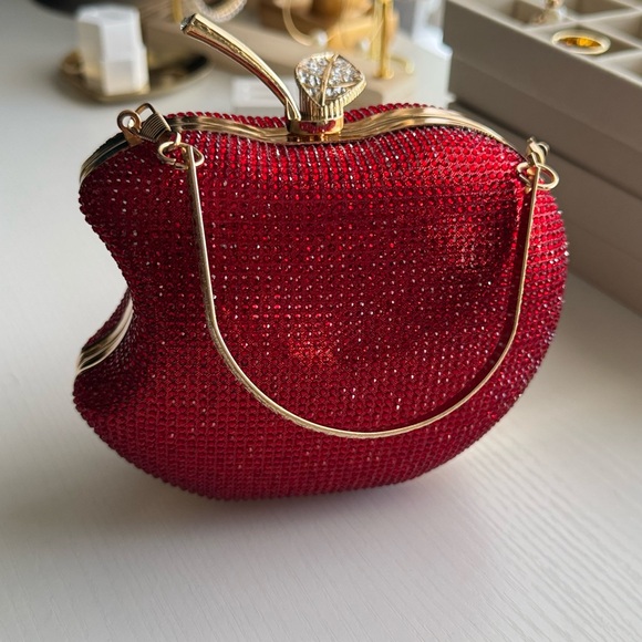 Apple Shaped Bag with Sparkles
Exclusive red apple-shaped bag, - Picture 6 of 7